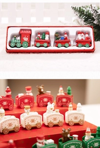 Vue détaillée du petit train de Noël en bois sur un fond de neige festif et élégant