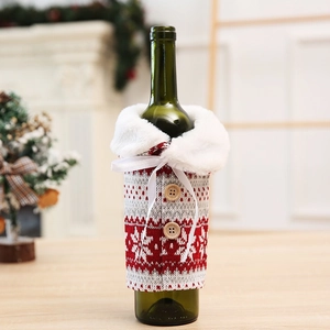 Knitted Christmas wine bottle cover with snowflake patterns and faux fur collar