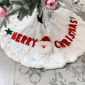 White faux fur Christmas tree skirt with golden snowflakes and Santa Claus 3D decoration
