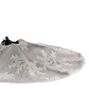 Gray plush Christmas tree skirt featuring white snowflake patterns and soft texture
