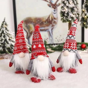 Three-piece Christmas gnome set with knitted hats and festive snowflake patterns