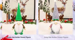 Detail von Weihnachts-Wichteln in Grün und Grau mit Rentiergeweihen und langen Bärten