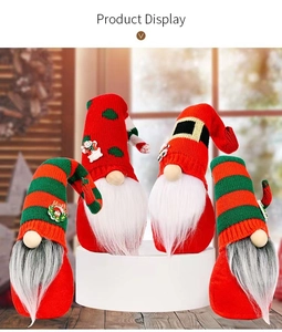 Detail of four Christmas gnomes on white stands with knitted hats and plush beards