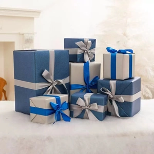 Exquisite blue and silver Christmas gift box set with ribbons for holiday home decoration