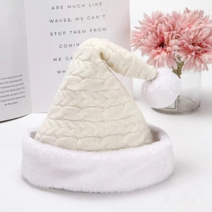 Thick white cable knit Christmas hat with soft plush trim and pom pom for winter