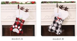 Plaid Christmas stockings in bone shape with reindeer antlers and paw patch details