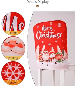 Detail view of red Christmas chair cover featuring Santa, snowman and reindeer prints