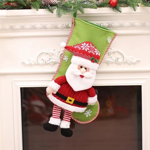 Detailed view of a 3D Santa Christmas stocking with long legs hanging on a white fireplace