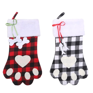Christmas buffalo plaid pet paw stockings with bone and fish charms for holiday decor