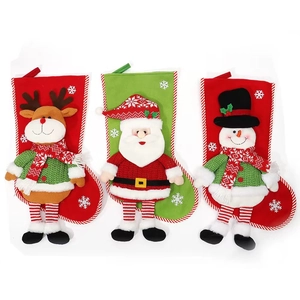 Three 3D cartoon Christmas stockings with Santa, reindeer, and snowman on white background