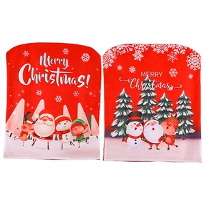 Christmas chair covers set with Santa Claus and snowman prints for festive dining room decor