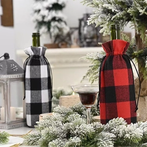 Festive red and black plaid wine bottle covers with drawstrings for Christmas decor