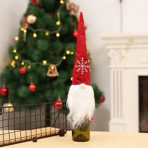 Plush Santa gnome wine bottle cover with red hat and snowflake for Christmas decor