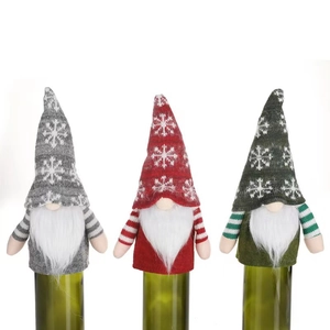 Set of 3 knitted gnome wine bottle covers with snowflakes and long striped sleeves