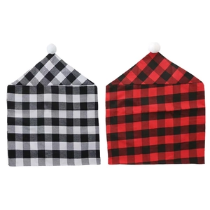 Christmas buffalo plaid chair covers with white pom-poms in red, black and white patterns