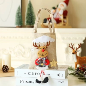 Detail view of linen Christmas gift bag featuring a 3D plush reindeer with scarf