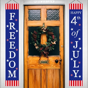 Detail of Independence Day door banners with stars and stripes hanging on a wooden door
