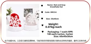 Detailed view of red and grey knitted snowflake Christmas hats with soft white plush trim
