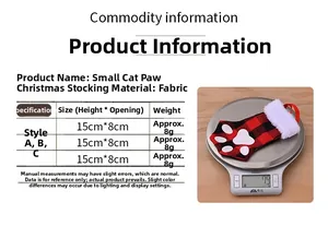 Detailed size chart showing cat paw Christmas stockings weight on electronic scale