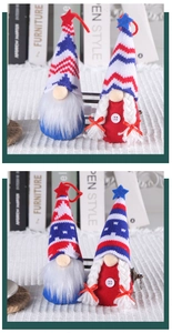 Close-up of Independence Day gnome couple featuring striped knitted hats and star details