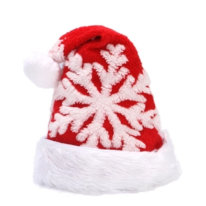 Red knit Christmas hat with white snowflake patterns and plush faux fur trim