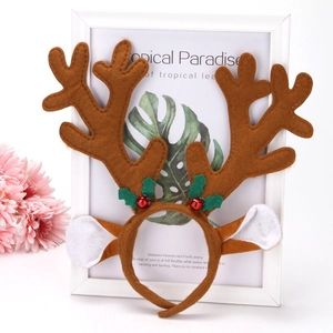 Festive Christmas reindeer antler headband with brown felt, holly leaves and red bells
