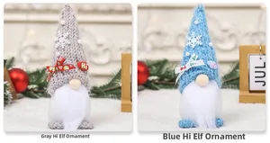 Detail of knitted Christmas gnomes in grey and blue with snowflake and Hi embroidery