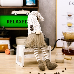 Coffee themed gnome plush with white knit hat, faux beans and long striped legs decoration