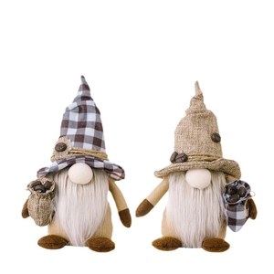 Pair of coffee gnome plush figurines with plaid hats and mini coffee bean sacks