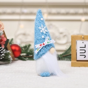 Blue knit Christmas gnome figurine with snowflake hat and beard for tabletop decor