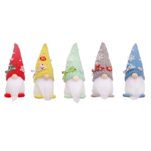 Set of five colorful knitted Christmas gnomes with snowflake and pearl hat decorations