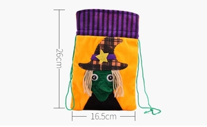 Detail showing 26cm by 16.5cm dimensions of Halloween witch candy bag with 3D applique