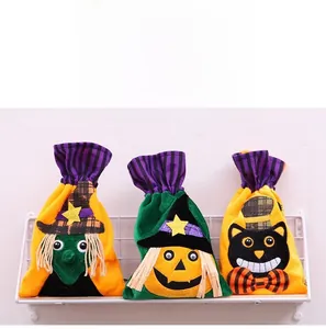 Detail of Halloween drawstring gift bags with velvet witch, pumpkin and cat embroidery