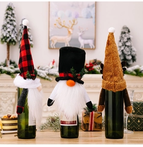 Detailed view of forest gnome wine bottle covers with plush beards and plaid hats