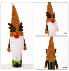 Detail view of gnome wine bottle cover featuring long brown plush fur and reindeer antlers