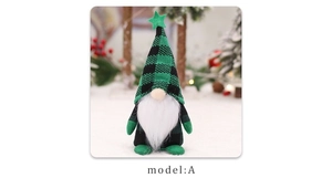 Detail of Christmas gnome with green and black checkered hat and white beard decoration