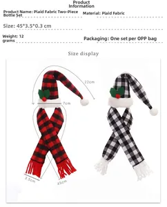 Detailed view of plaid Christmas wine bottle covers with scarf and mini pompom hat decor