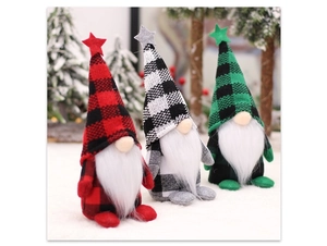 Close-up of three Christmas gnomes with plaid hats and stars in a snowy scene