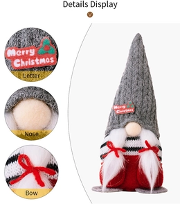 Detail display of Christmas gnome with Merry Christmas embroidery and red ribbon bows