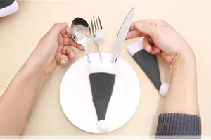 Mini grey Christmas hat cutlery holder for table decoration and silverwares