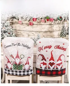 Detail of Christmas chair covers featuring Nordic gnomes and festive buffalo plaid fabric