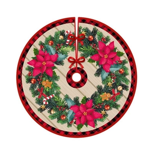 Round Christmas tree skirt featuring plaid border and gingerbread man festive prints