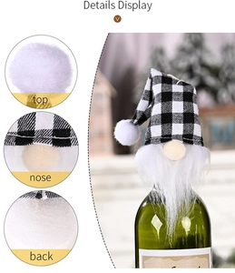 Detail display of Christmas gnome wine bottle cover with plaid hat and plush beard texture