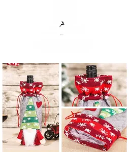 Detail of Christmas gnome wine bottle cover with knit snowflake top and grey felt body