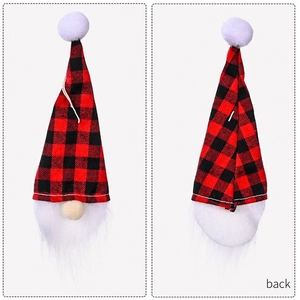 Detail of red and black buffalo plaid gnome wine bottle cover showing front and back views