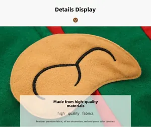 Detail display of festive elf hat featuring red and green felt with decorative pointed ears