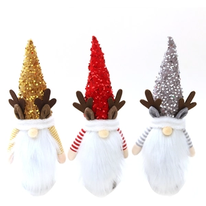 Three Christmas gnomes with sequined hats and antlers for holiday bottle decoration
