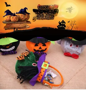 Detail of Halloween plush gift bags showing witch pumpkin and black cat designs