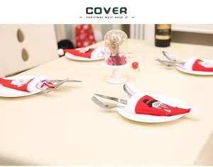 Détails des porte-couverts en mini bonnet de Noël avec broderie Père Noël et bonhomme