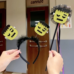 Halloween Frankenstein headband and wand set with green glitter and black feathers